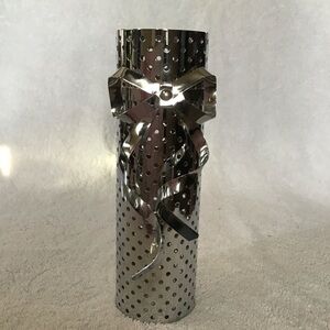 Bath & Body Works mist holder. Silver metal with a bow
